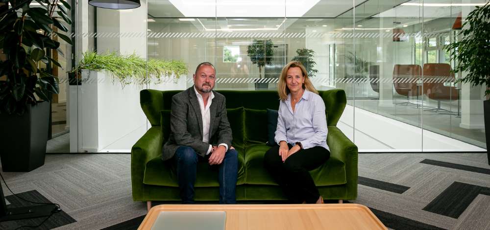 Shane McElroy Head of Global ATM Strategy at Fexco DCC and Irene Bruner CFO & Executive Director of DAI Group announce the partnership